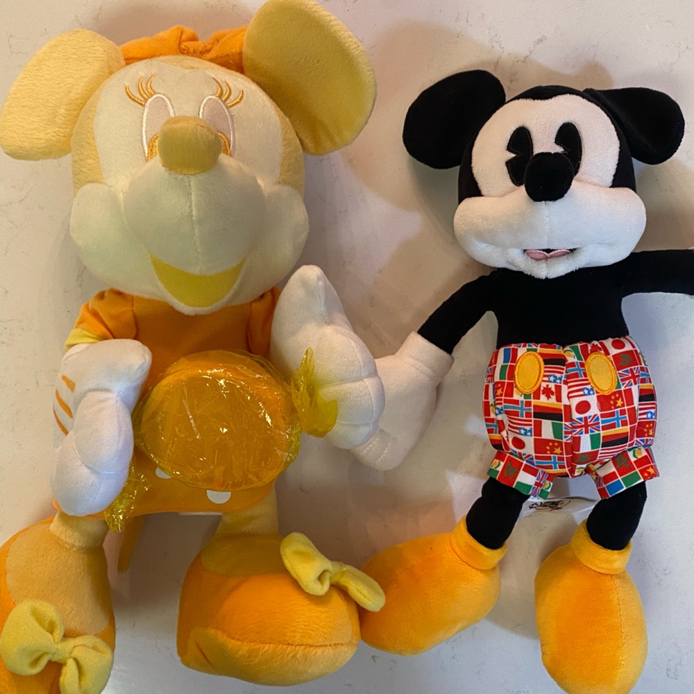 Disney Mickey Mouse and Minnie Mouse collectible plush.